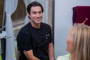 Dr. Ryan Hill, with dental patient.